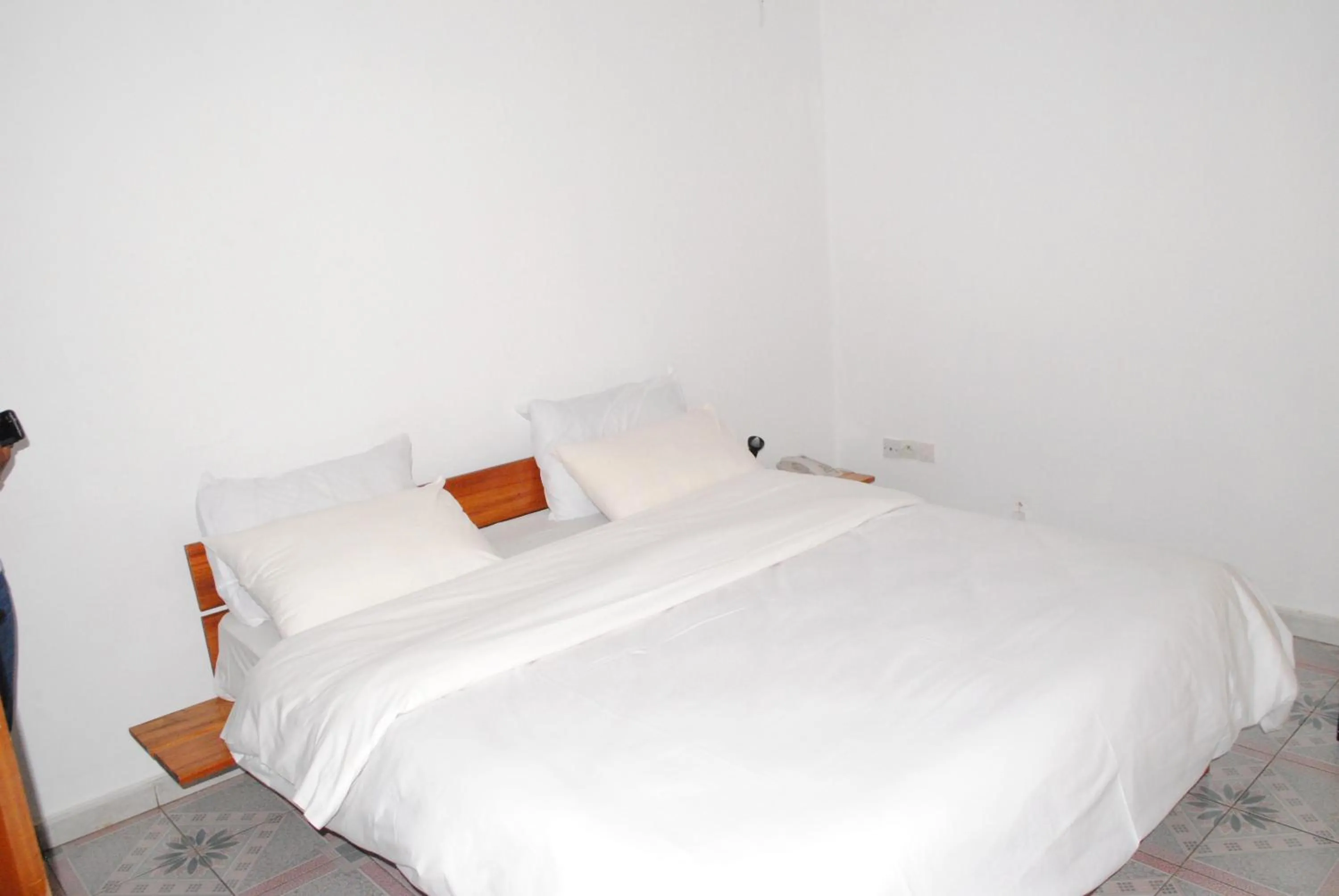 Bed in Kiriri Residence Hotel