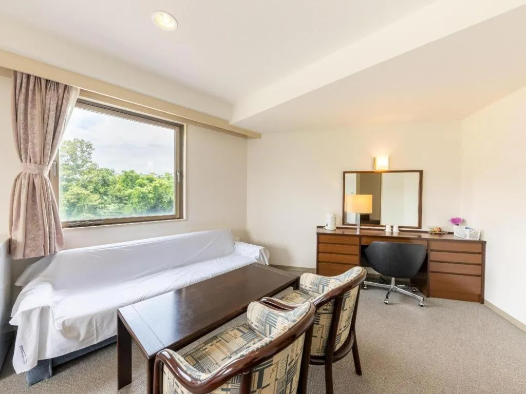 Bed in Tabist Yabuki Station Hotel