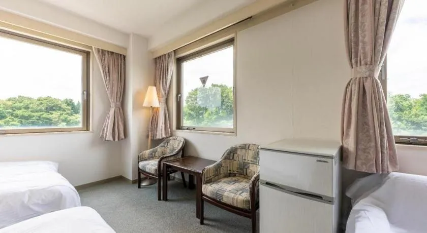 Bed in Tabist Yabuki Station Hotel