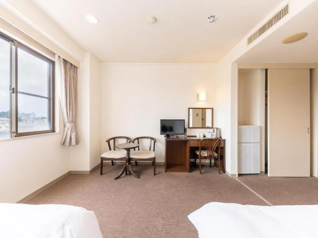 Bed in Tabist Yabuki Station Hotel