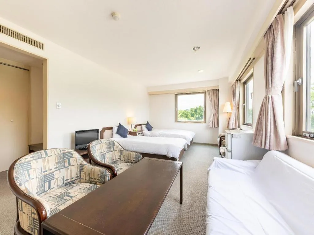 Bed in Tabist Yabuki Station Hotel