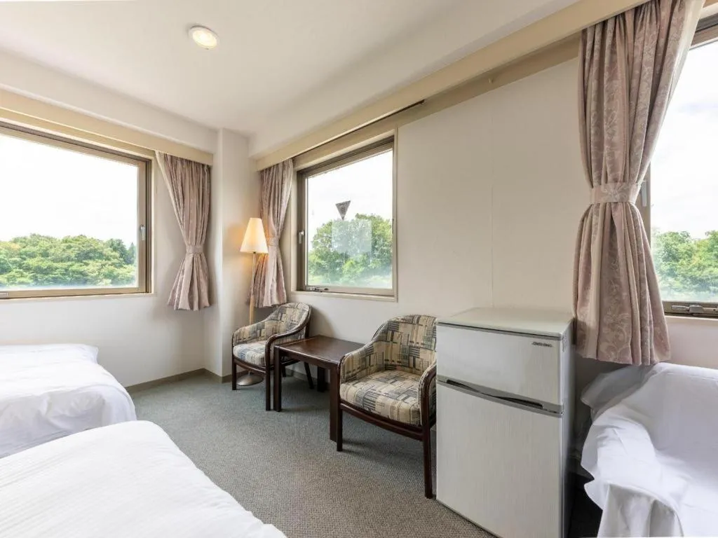 Bed in Tabist Yabuki Station Hotel