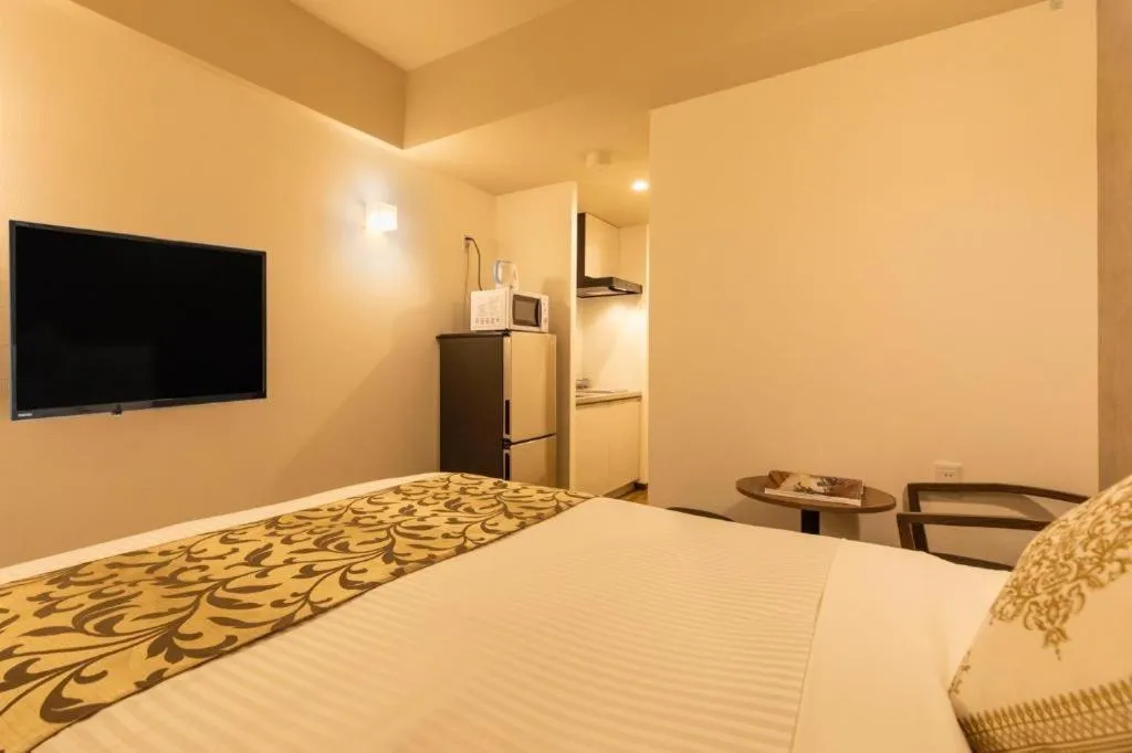 Bed in Mr.KINJO in NAHA