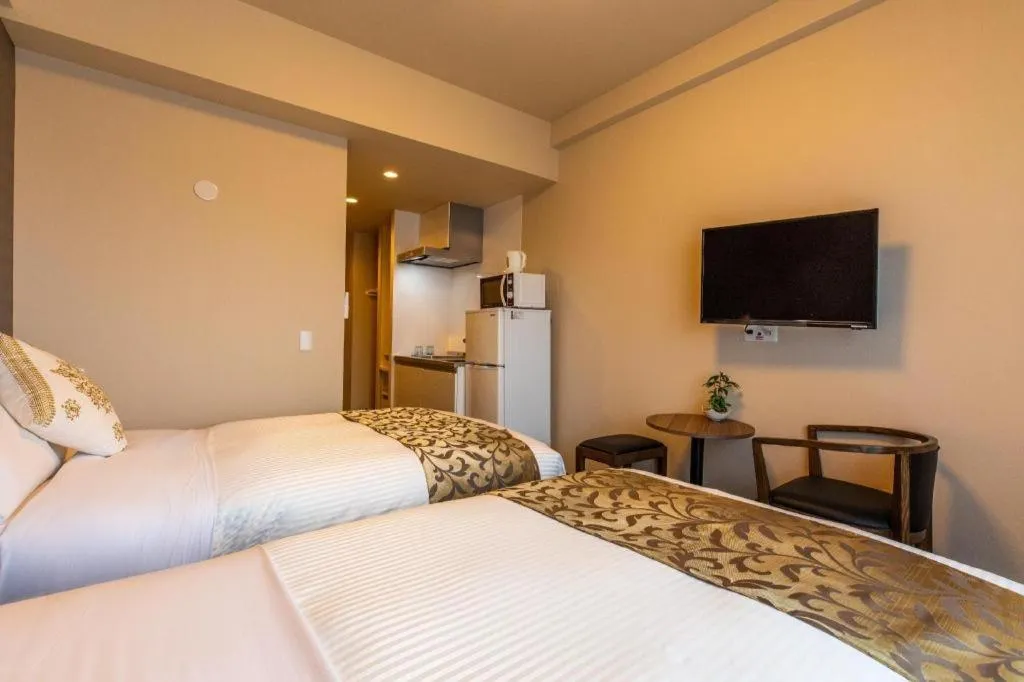 Bed in Mr.KINJO LINK in KUME NAHA