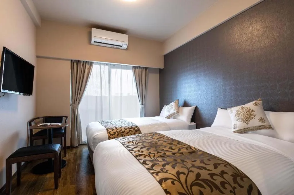 Bed in Mr.KINJO LINK in KUME NAHA