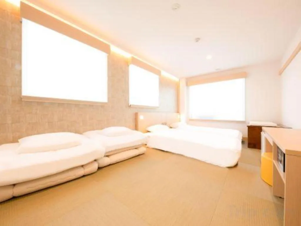 Bed in NAMBA EBISU HOTEL