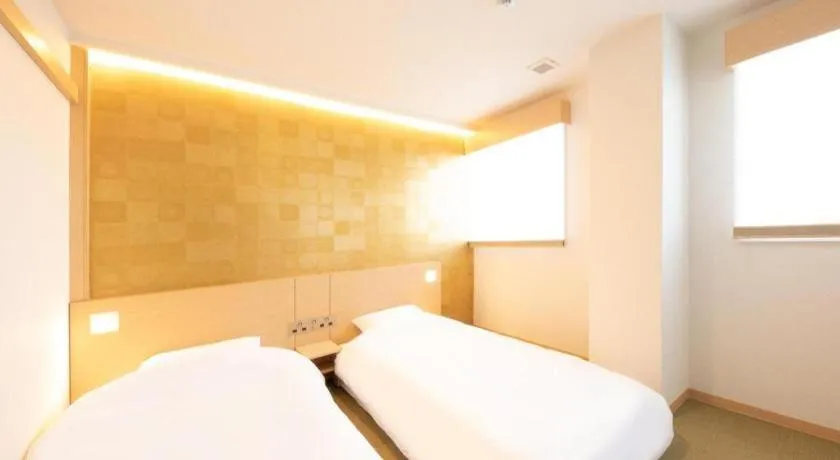 Bed in NAMBA EBISU HOTEL