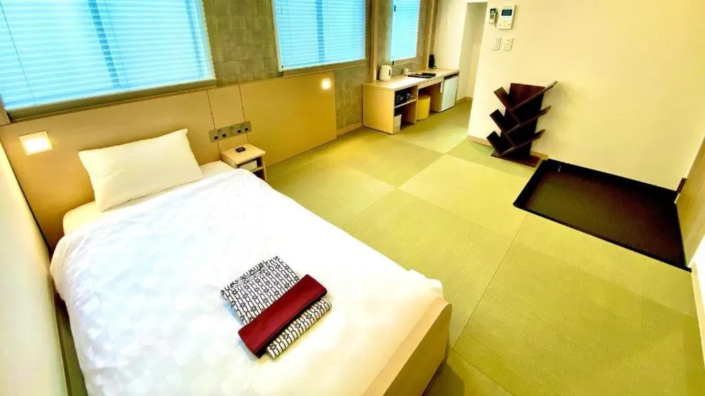 Bed in NAMBA EBISU HOTEL