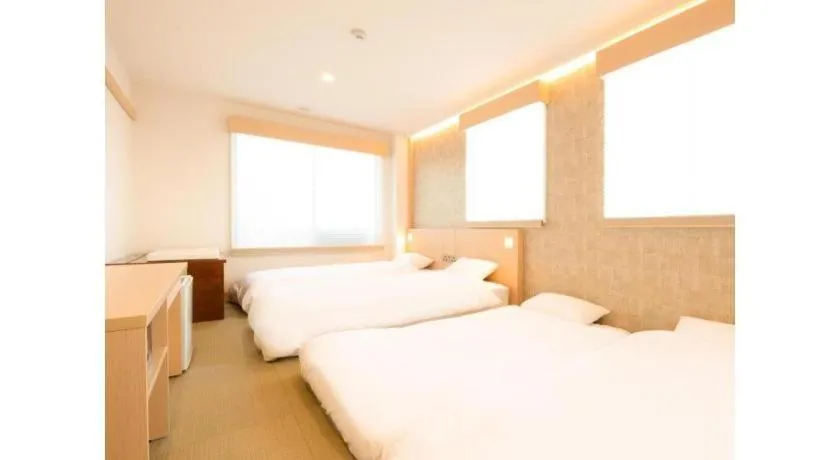 Bed in NAMBA EBISU HOTEL