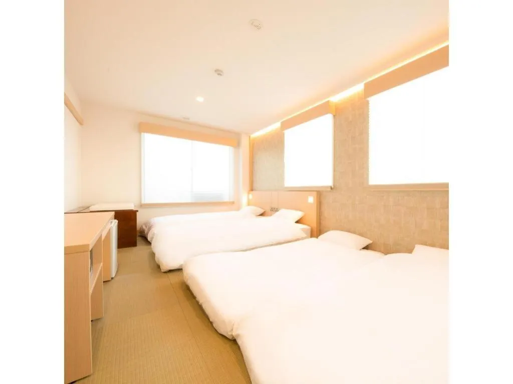 Bed in NAMBA EBISU HOTEL