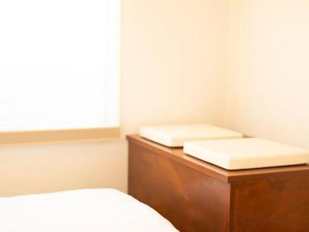 Bed in NAMBA EBISU HOTEL