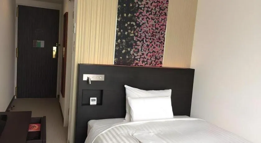 Bed in JR-EAST HOTEL METS NAGAOKA