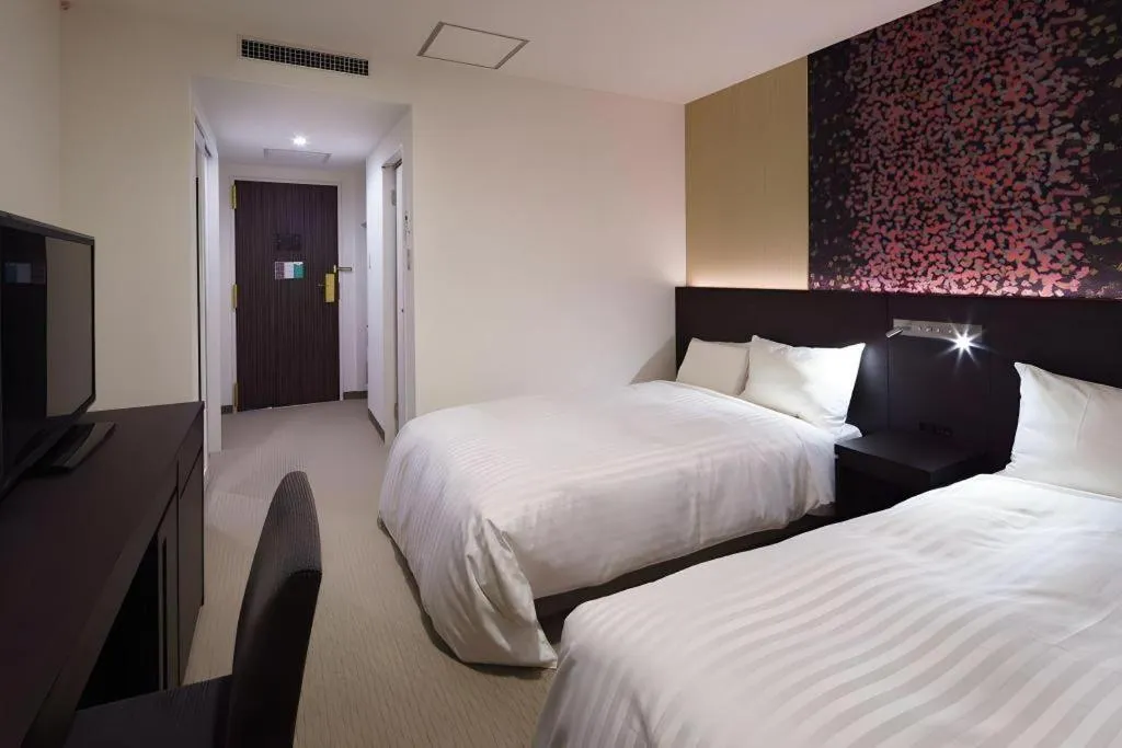 Bed in JR-EAST HOTEL METS NAGAOKA