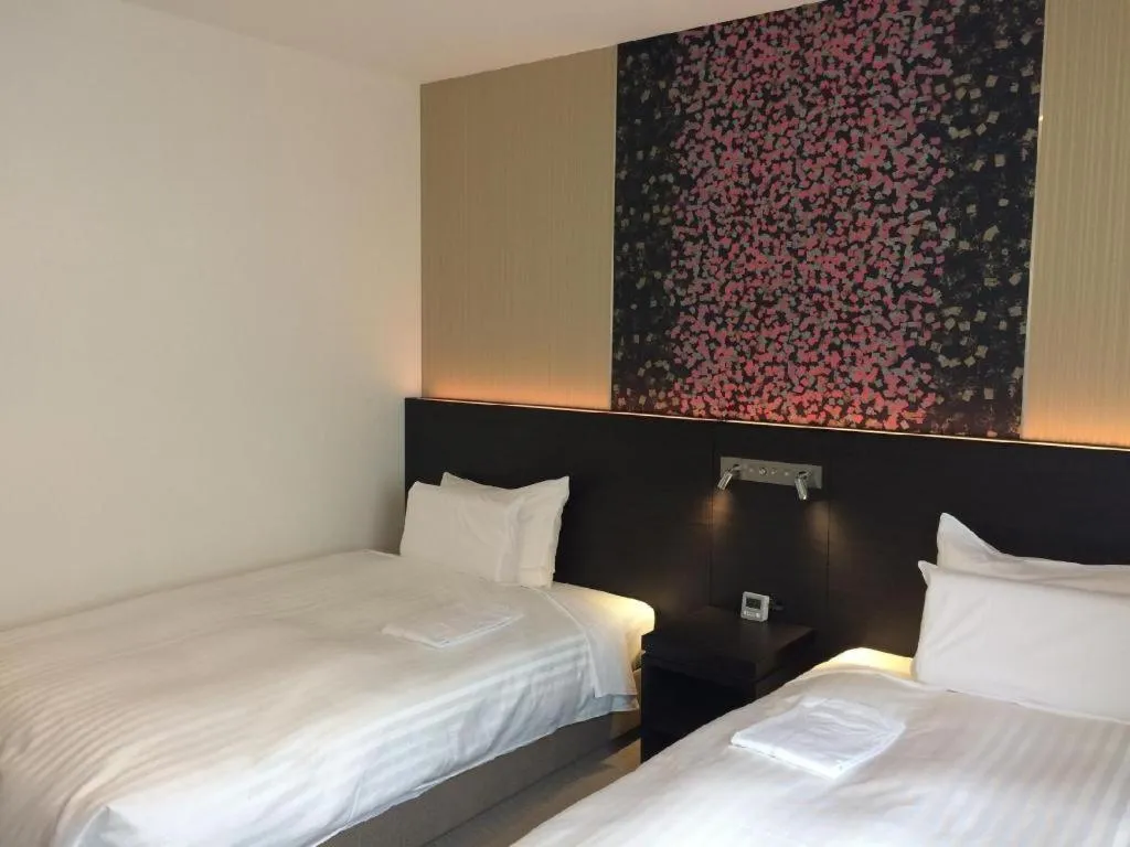 Bed in JR-EAST HOTEL METS NAGAOKA