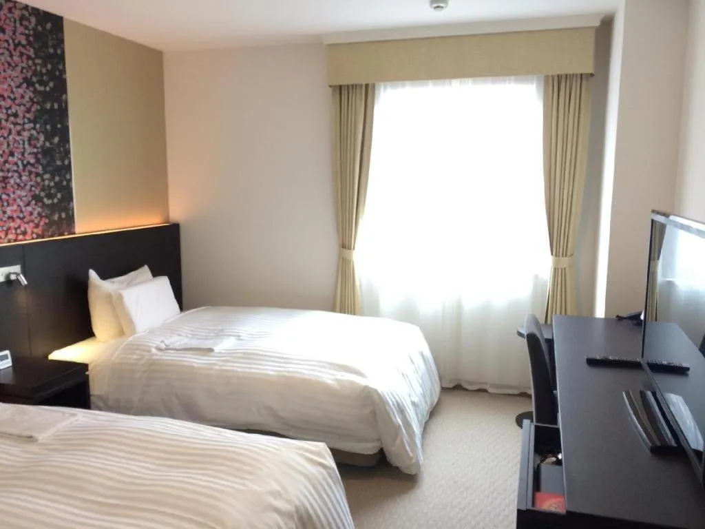 Bed in JR-EAST HOTEL METS NAGAOKA