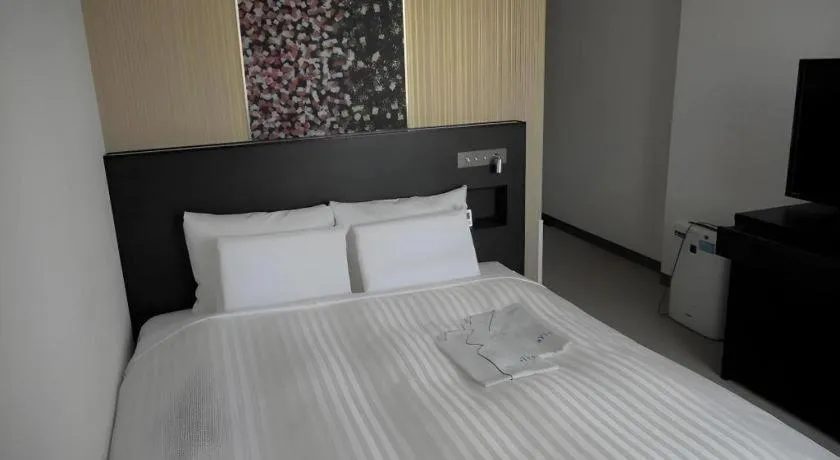 Bed in JR-EAST HOTEL METS NAGAOKA