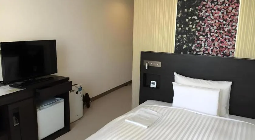 Bed in JR-EAST HOTEL METS NAGAOKA