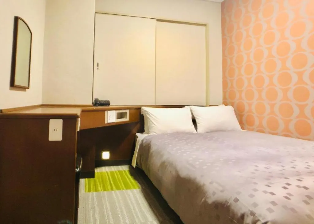 Bed in Urban Place Inn Kokura