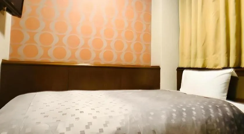 Bed in Urban Place Inn Kokura