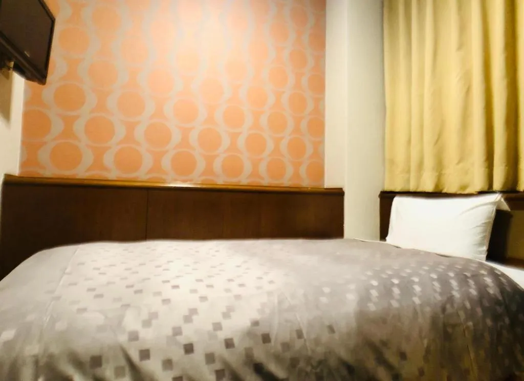 Bed in Urban Place Inn Kokura