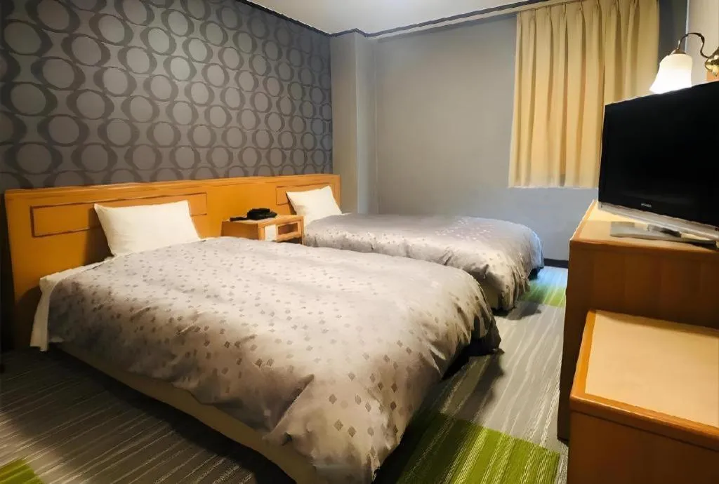 Bed in Urban Place Inn Kokura