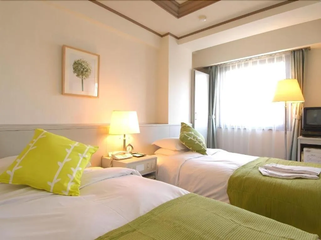 Bed in Matsumoto Wellton Hotel