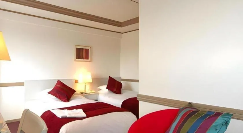 Bed in Matsumoto Wellton Hotel