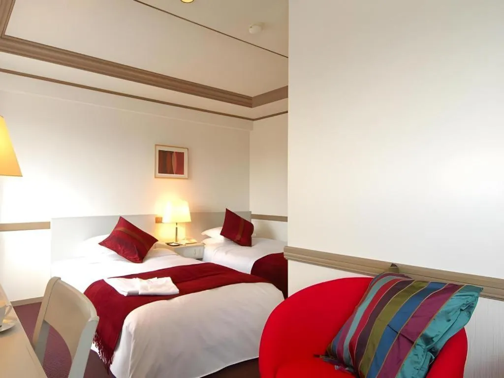 Bed in Matsumoto Wellton Hotel