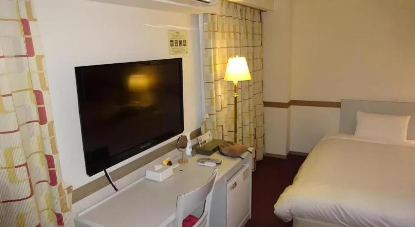 Bed in Matsumoto Wellton Hotel