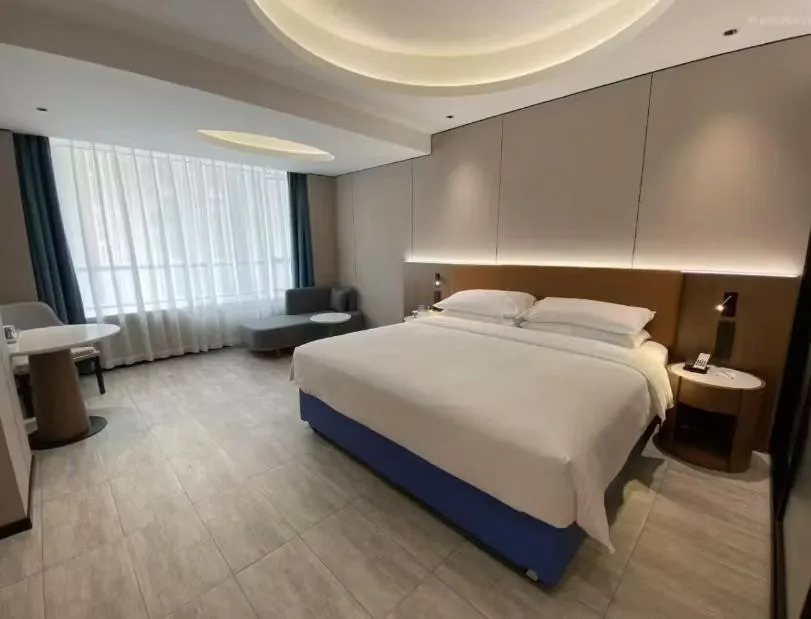 Bed in Echarm Hotel - Foshan Sanshui Wanda Plaza