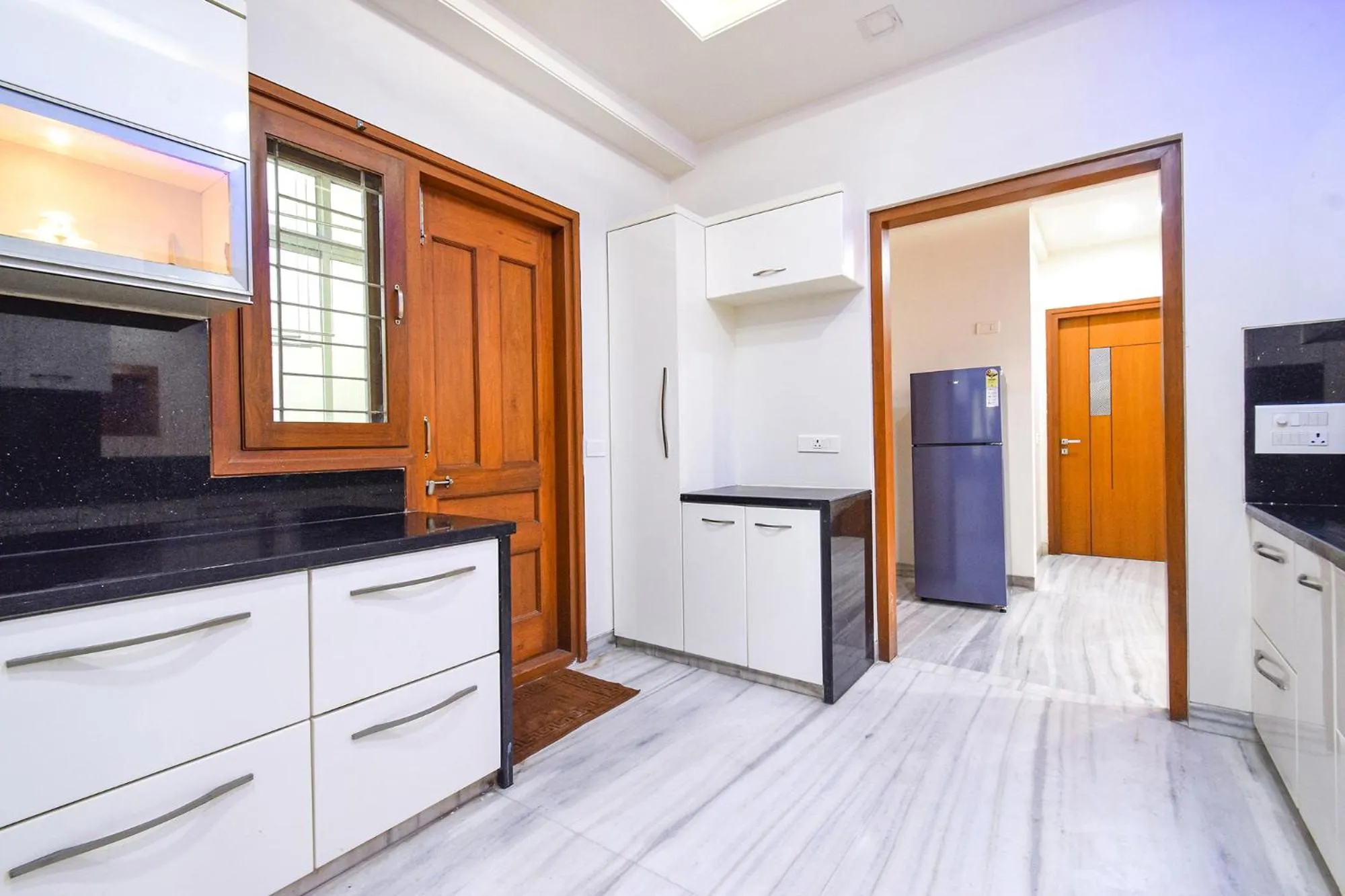 Kitchen or kitchenette in FabHotel De Alphabet II - Nr Ameerpet Metro Station