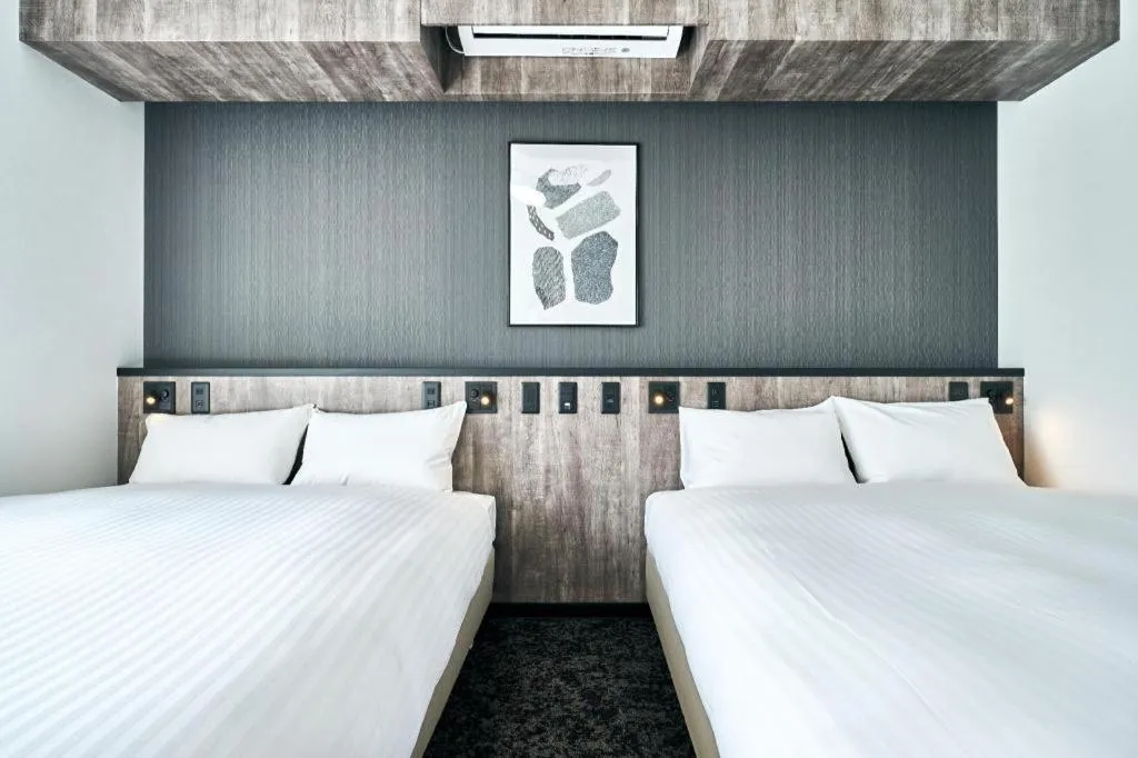 Bed in Grand STAY Hakata Station North