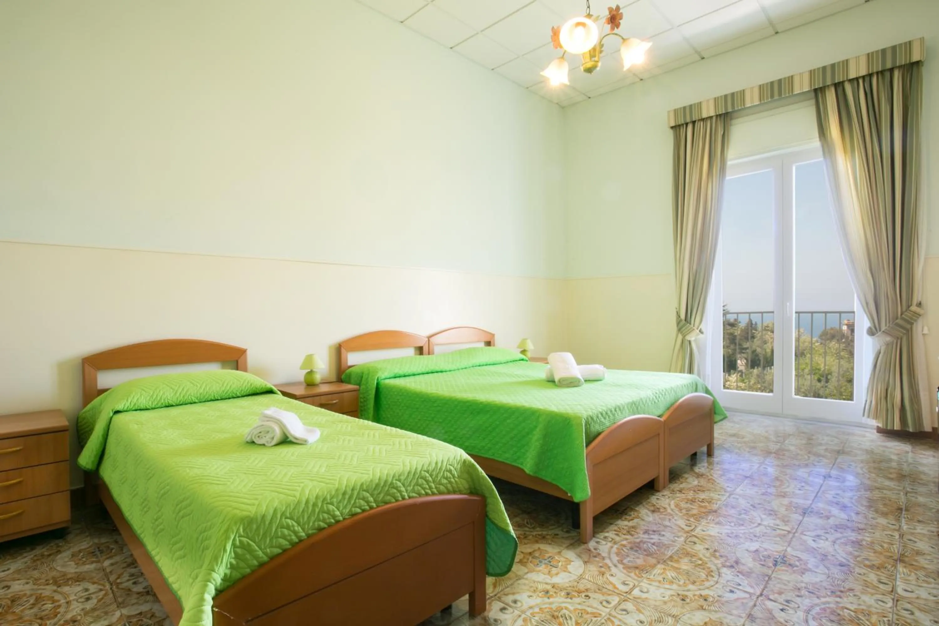 Photo of the whole room, Bed in Sisters Hotel