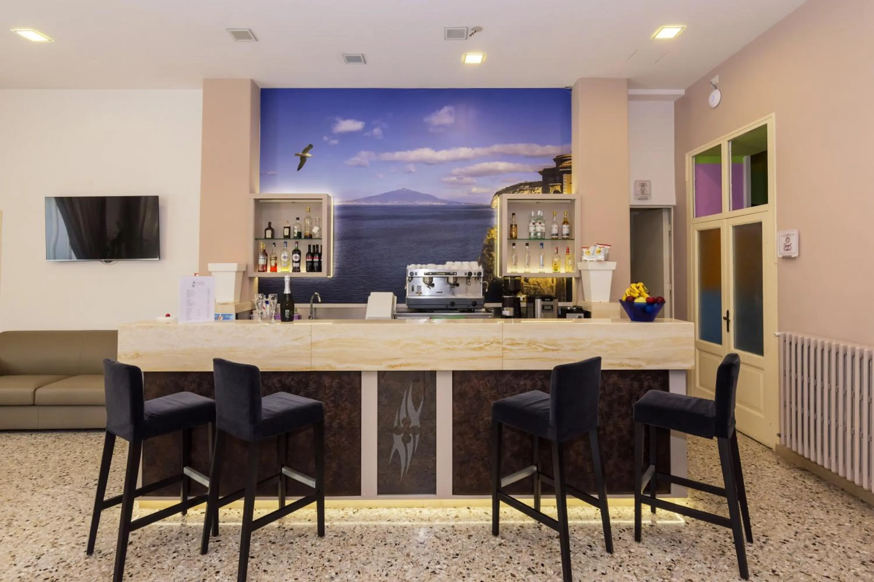 Communal lounge/ TV room in Sisters Hotel