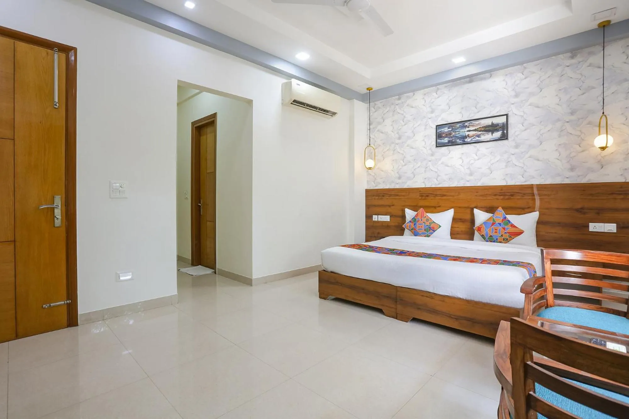 Bed in FabHotel New Journey Hospitality Near MG Road & Sikanderpur Metro