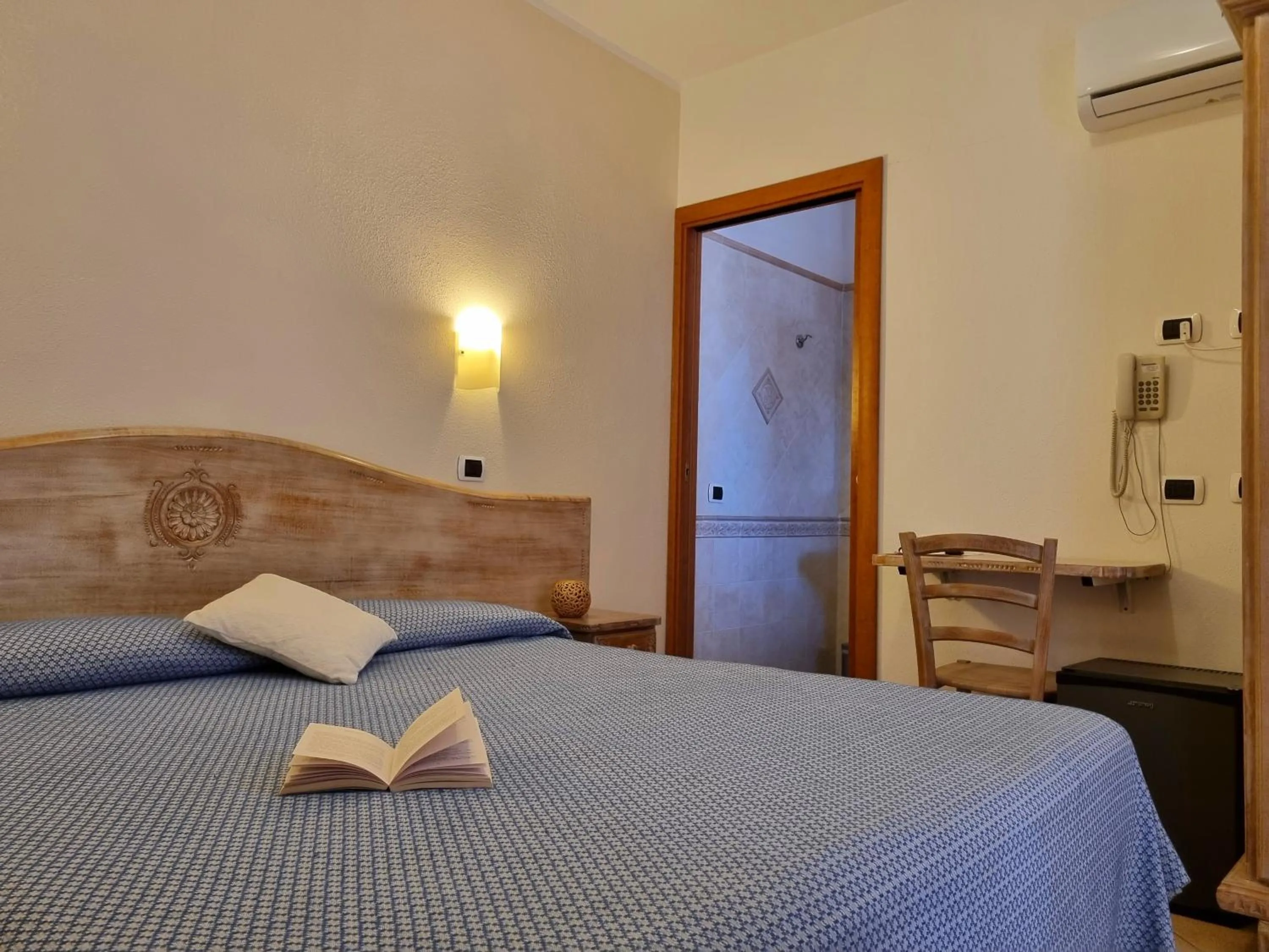 Bed in Hotel Delle Isole