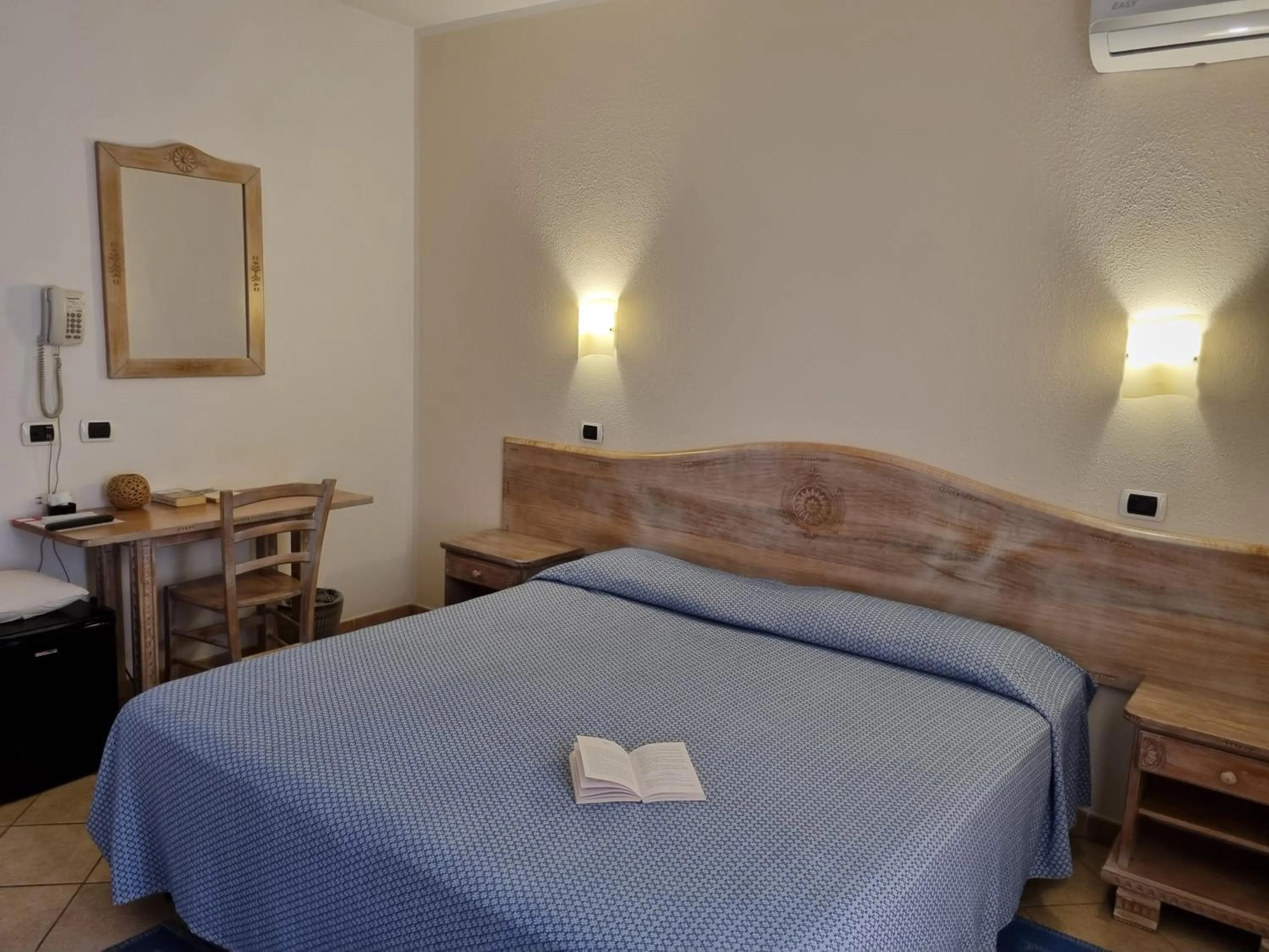 Bed in Hotel Delle Isole