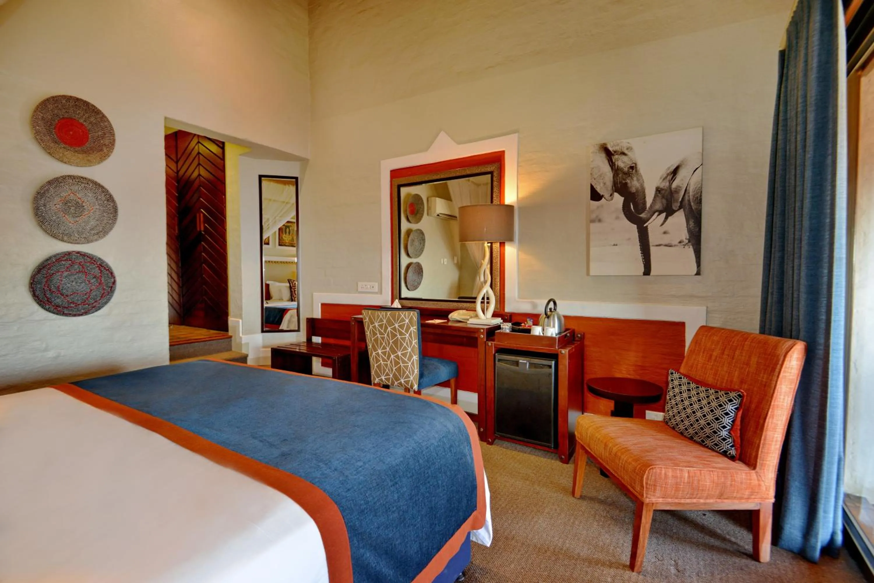 Photo of the whole room, Bed in Victoria Falls Safari Lodge
