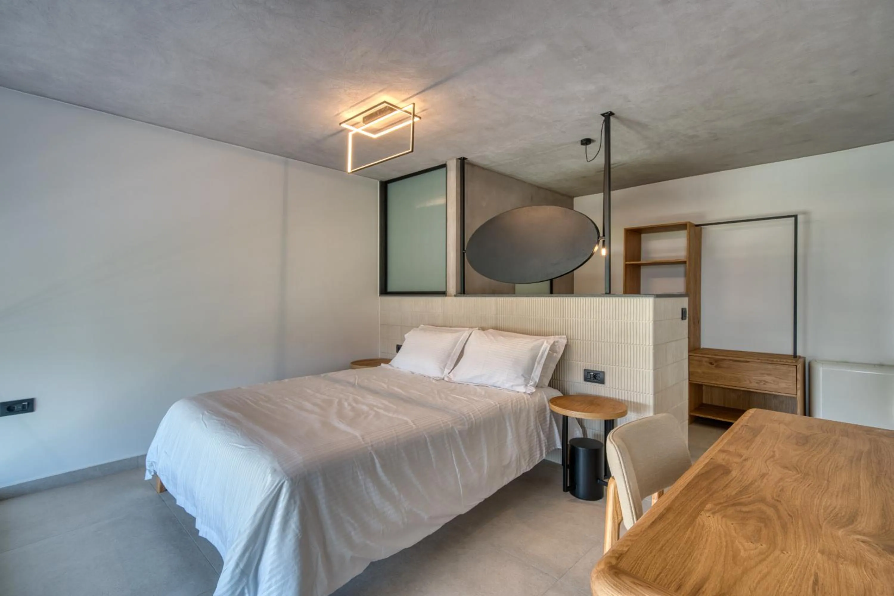 Bed in Anima Deluxe Suites