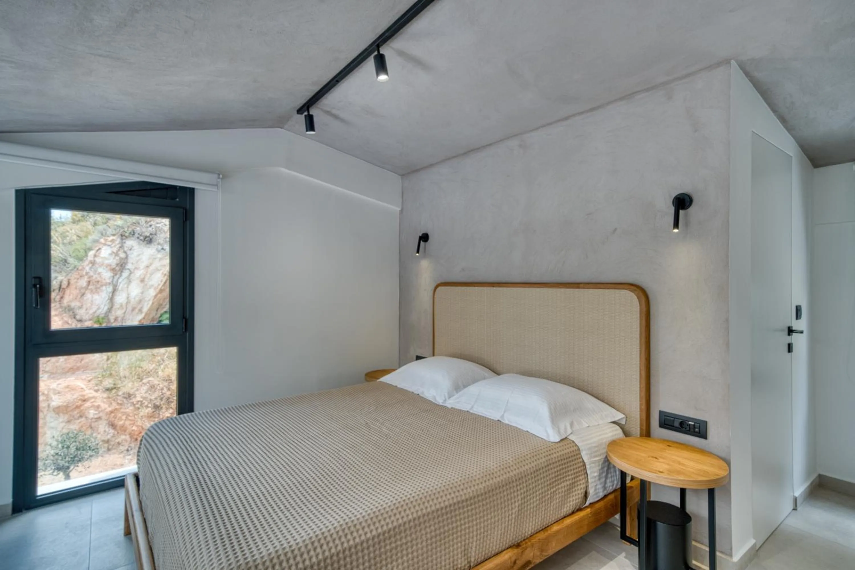 Bed in Anima Deluxe Suites