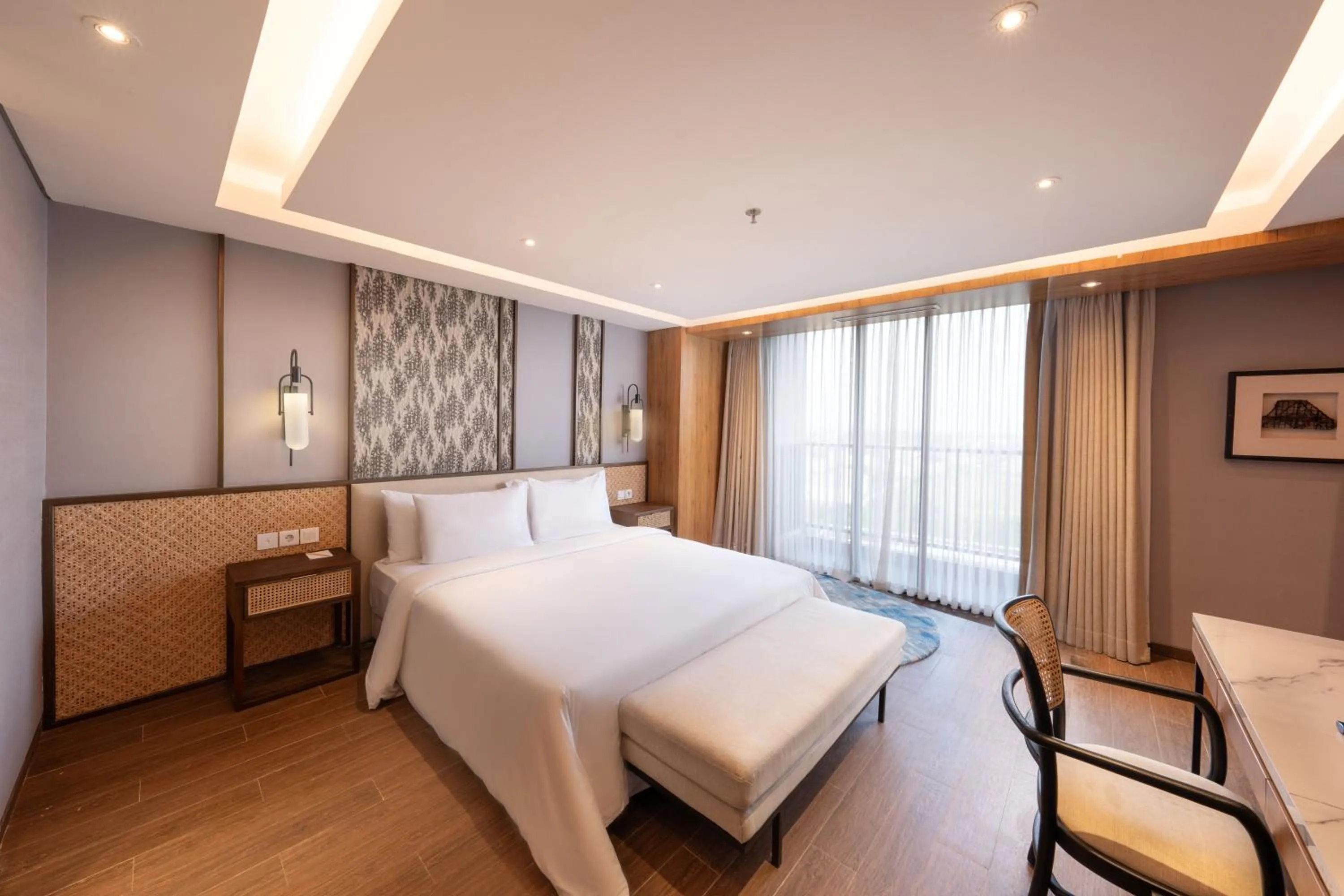 Bed in Myze Hotel Sumenep