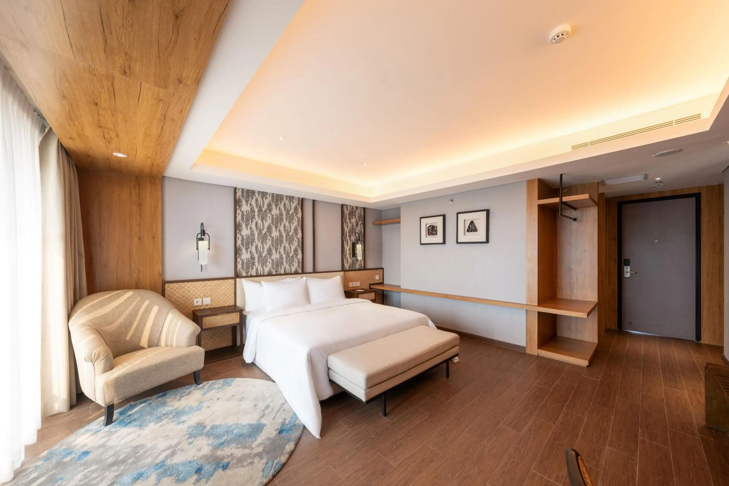 Bed in Myze Hotel Sumenep