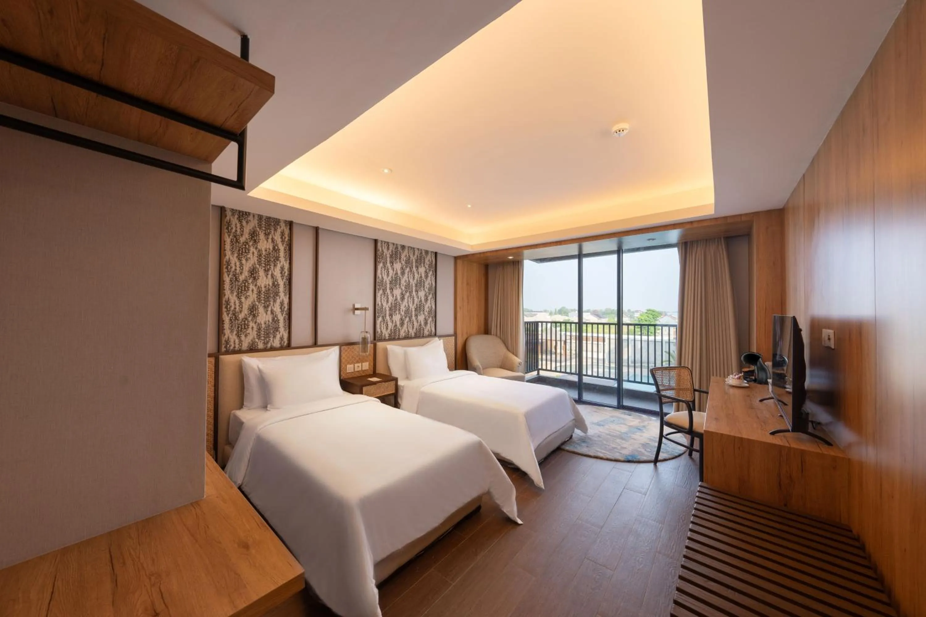 Bed in Myze Hotel Sumenep