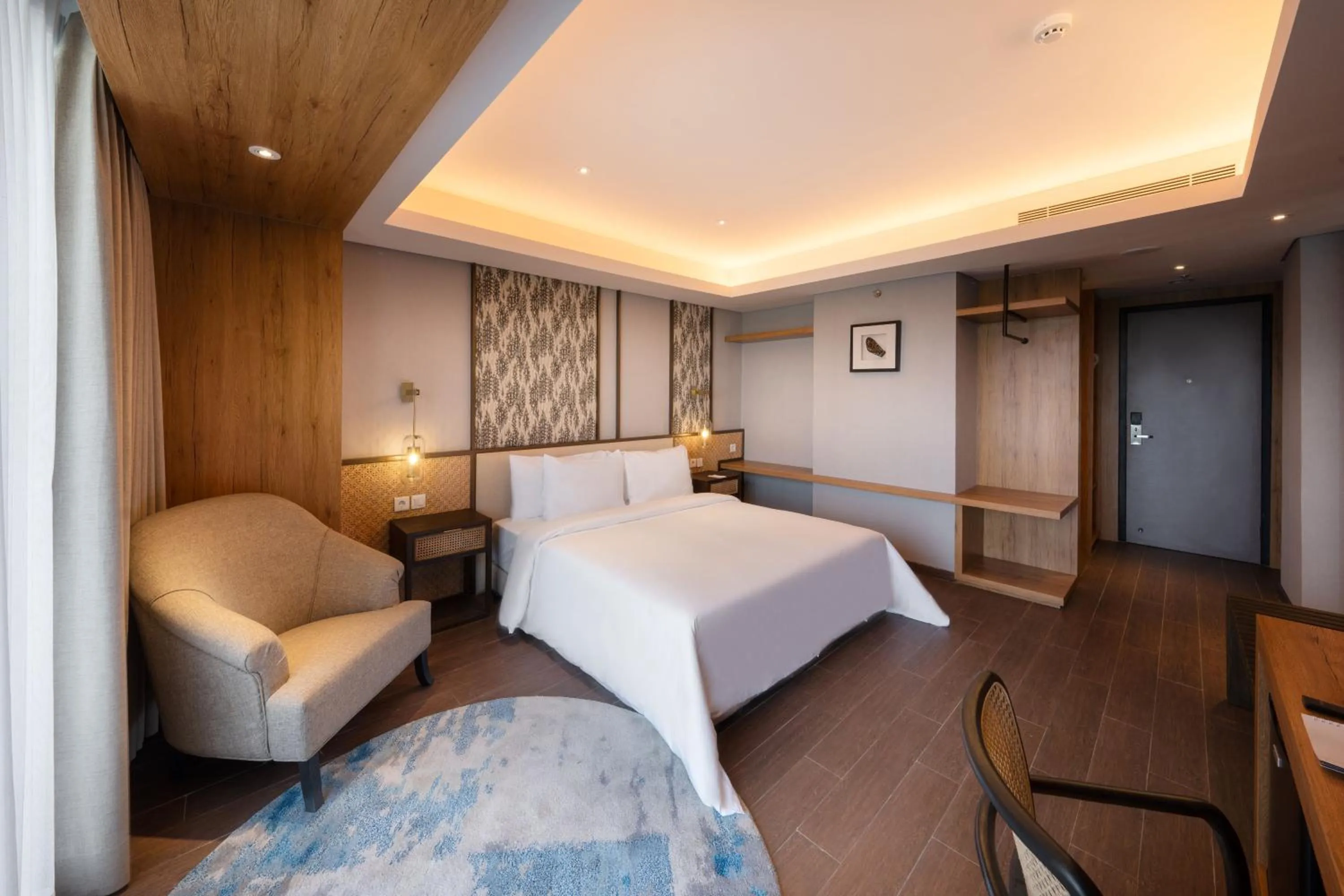 Bed in Myze Hotel Sumenep