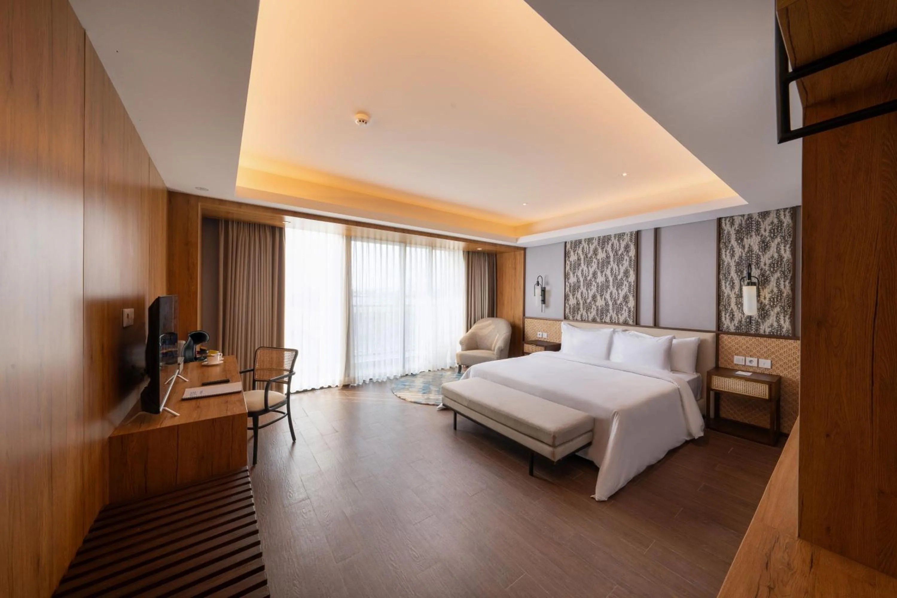 Bed in Myze Hotel Sumenep