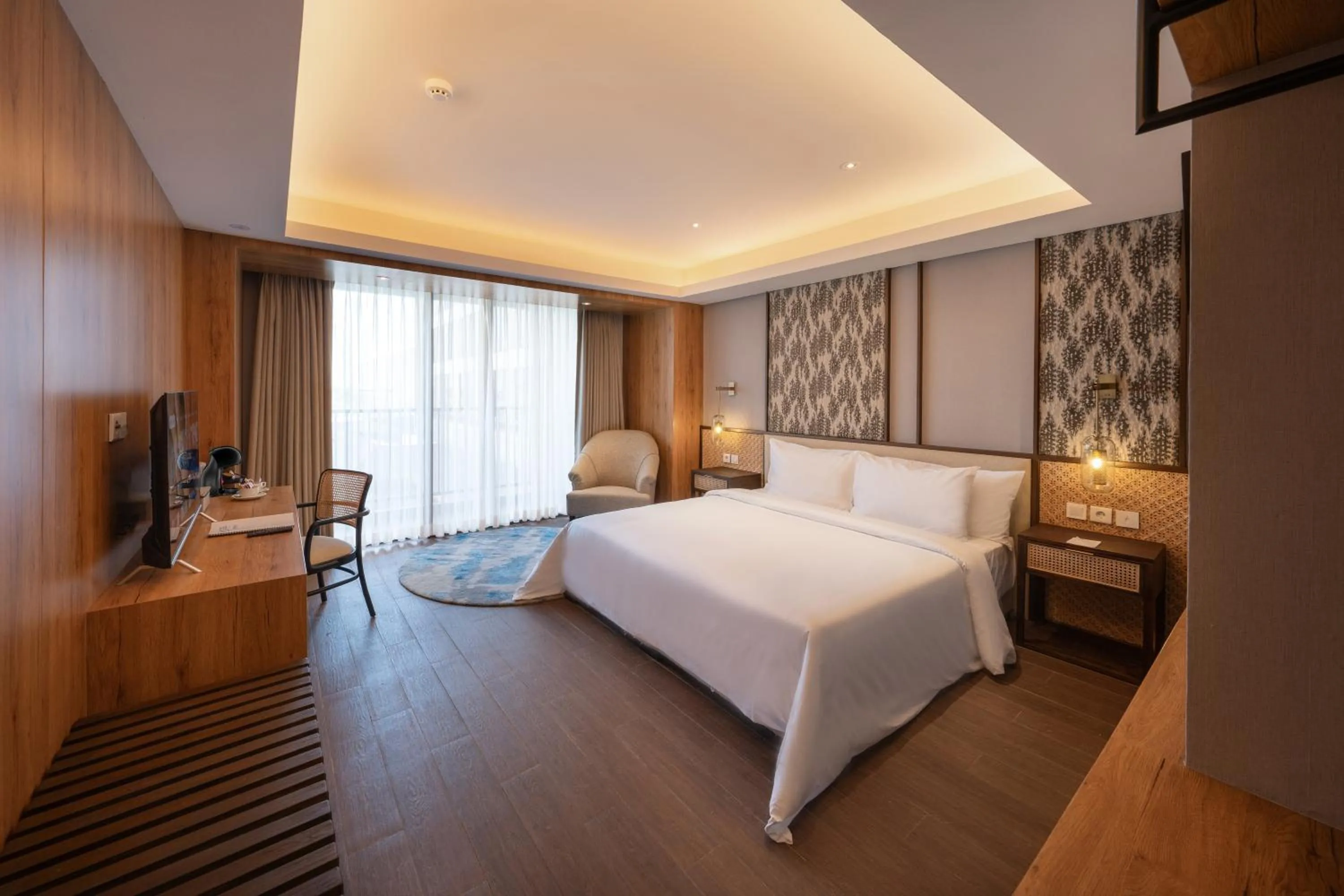 Bed in Myze Hotel Sumenep