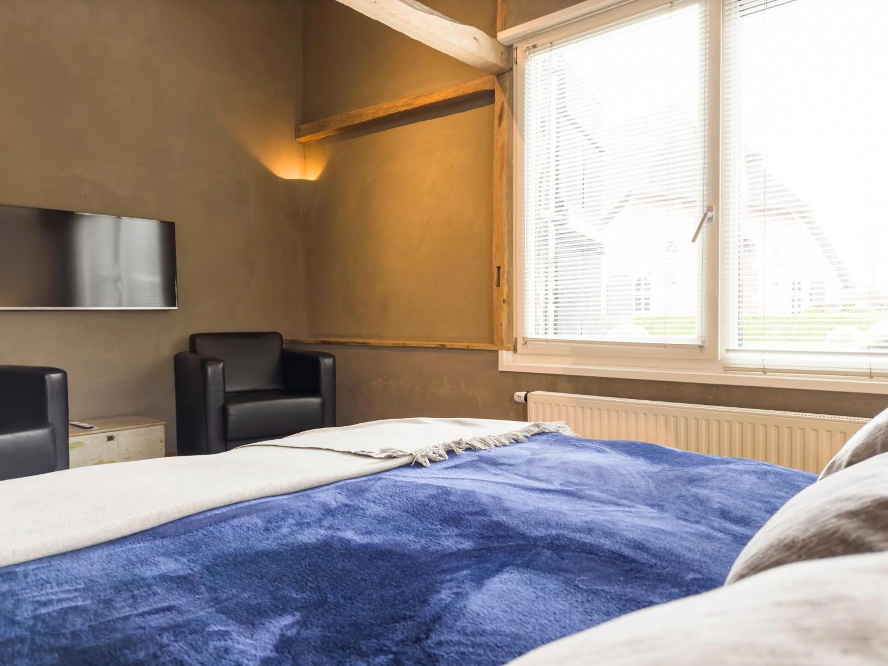 Bed in Herberg de Kemper