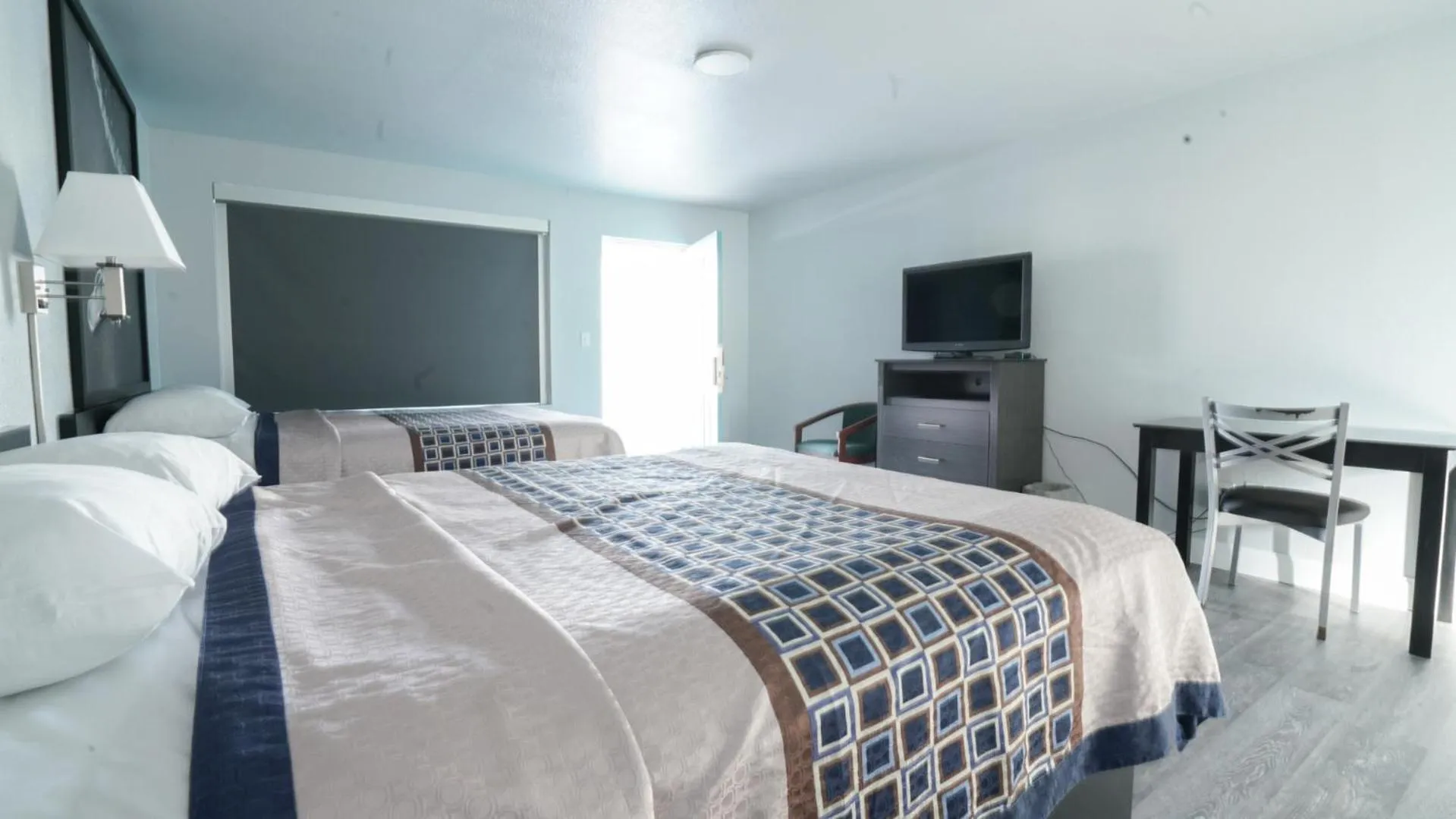 Bed in Ocean Breeze Inn