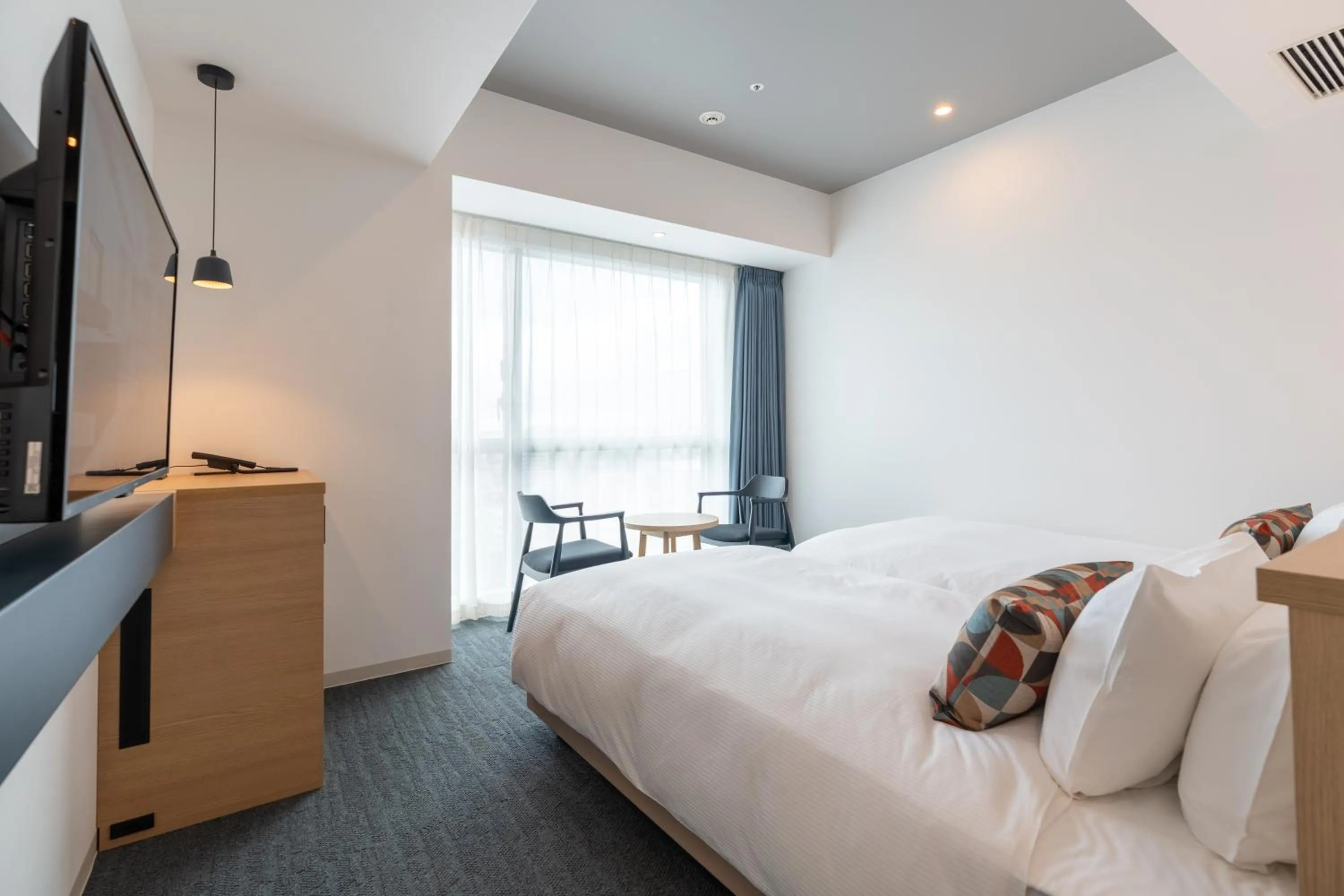 Photo of the whole room, Bed in La'gent Hotel Okinawa Naha