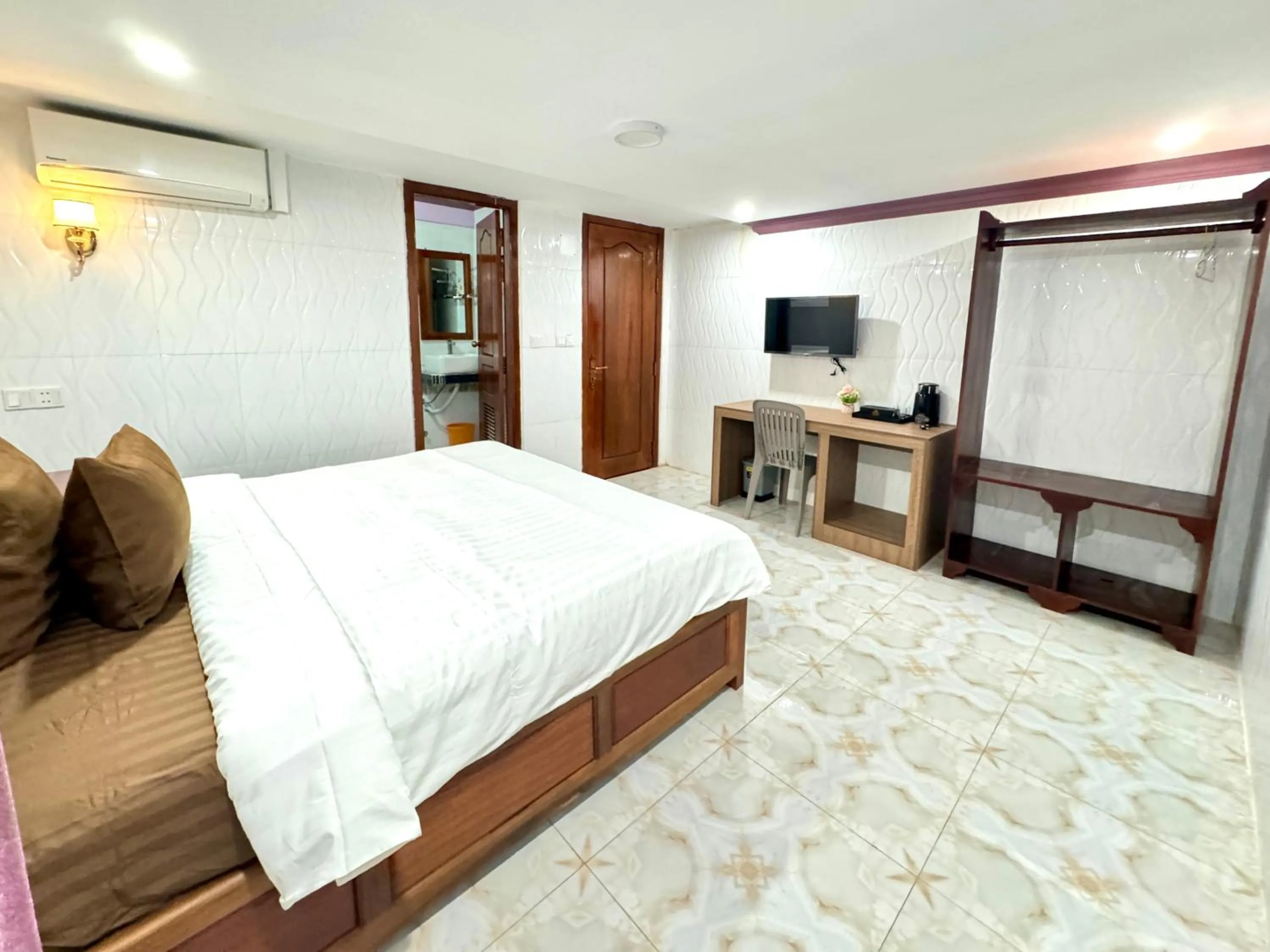 Bed in The Cozy Corner-Budget Hotel